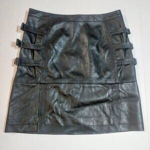 BCBG  BLACK LEATHER-LIKE MINI SKIRT WITH TRIPLE BUCKLE SIDE STRAPS SIZE 8/T